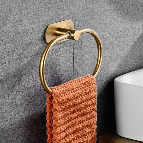 Porte serviette or fixé au mur